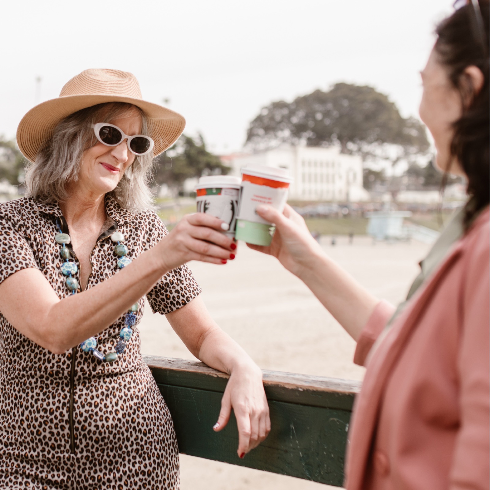 Two women talking over coffee, everyday support for understanding your health and nutrition in Brisbane